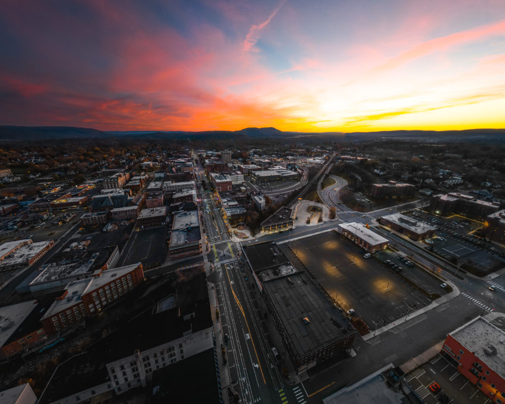 Aerial sunset over Pittsfield Massachusetts with clouds