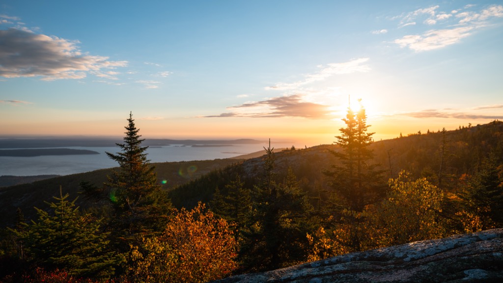 Sunrise seen from the summit of Cadillac Mountain in Acadia National Park, looking out over the Atlantic